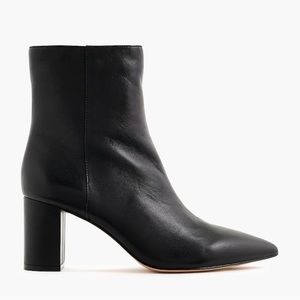 Black ankle boots. Pointed-toe boots in leather
